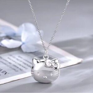Hello Kitty Silver Locket Pendant Necklace that opens Brand new in package